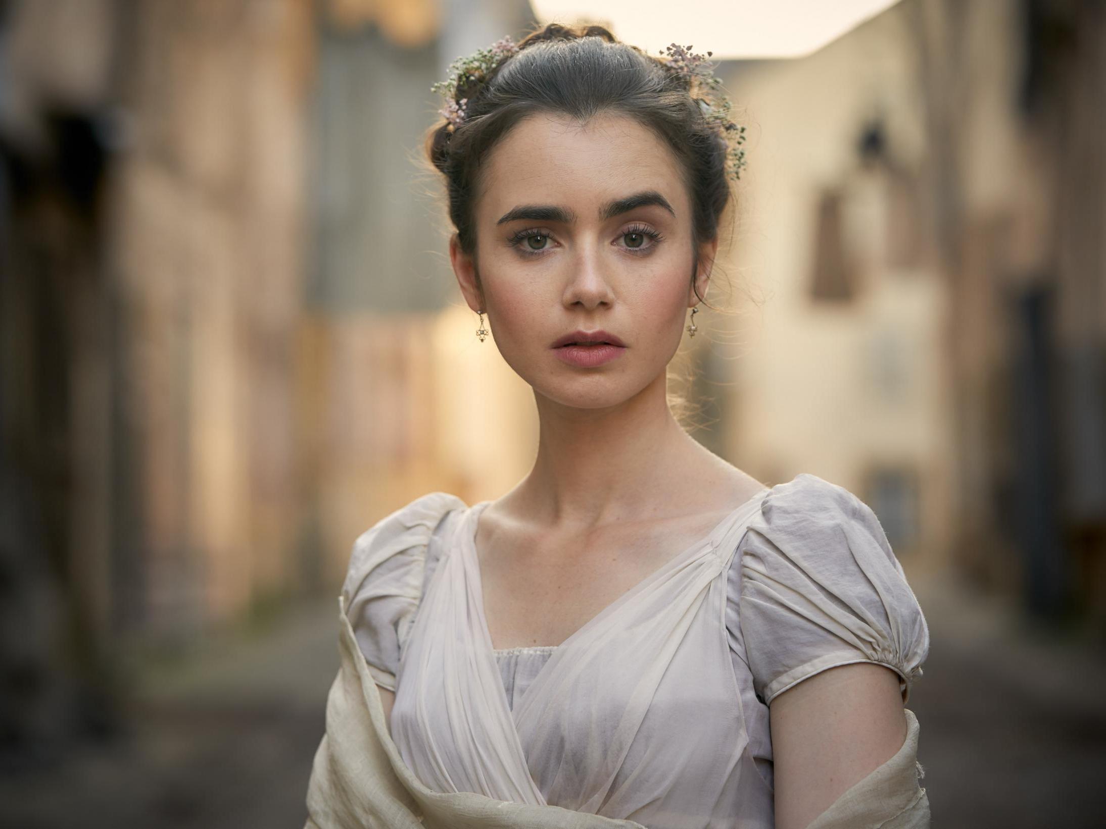 Lily Collins as Fantine