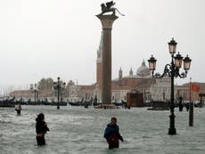 Three-quarters of Venice flooded as six die in storms across Italy