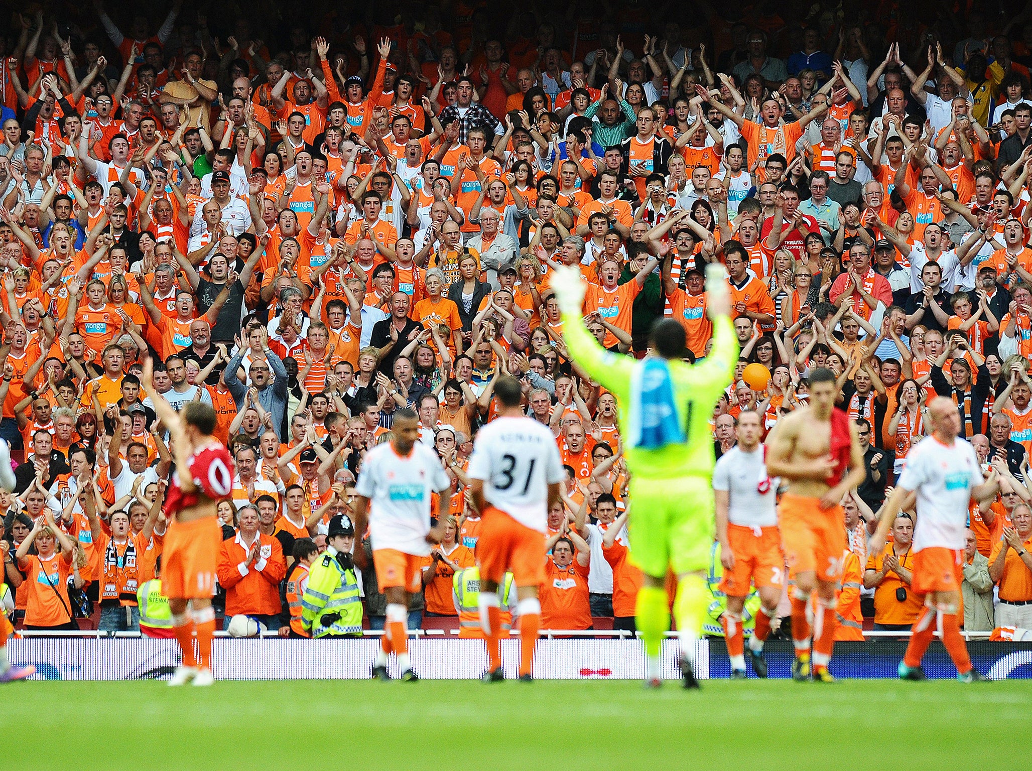 Blackpool's players salute their fans at The Emirates in 2010