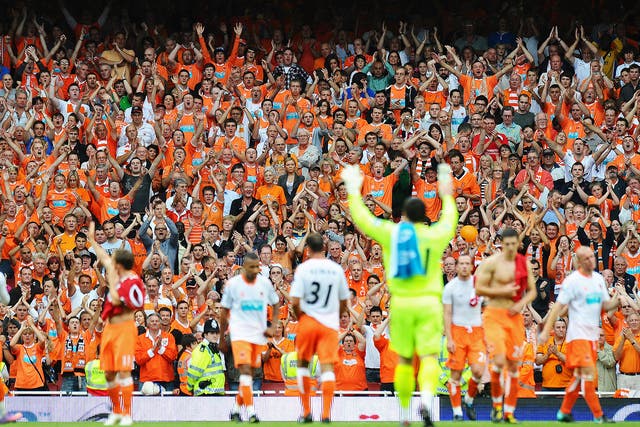Blackpool's players salute their fans at The Emirates in 2010