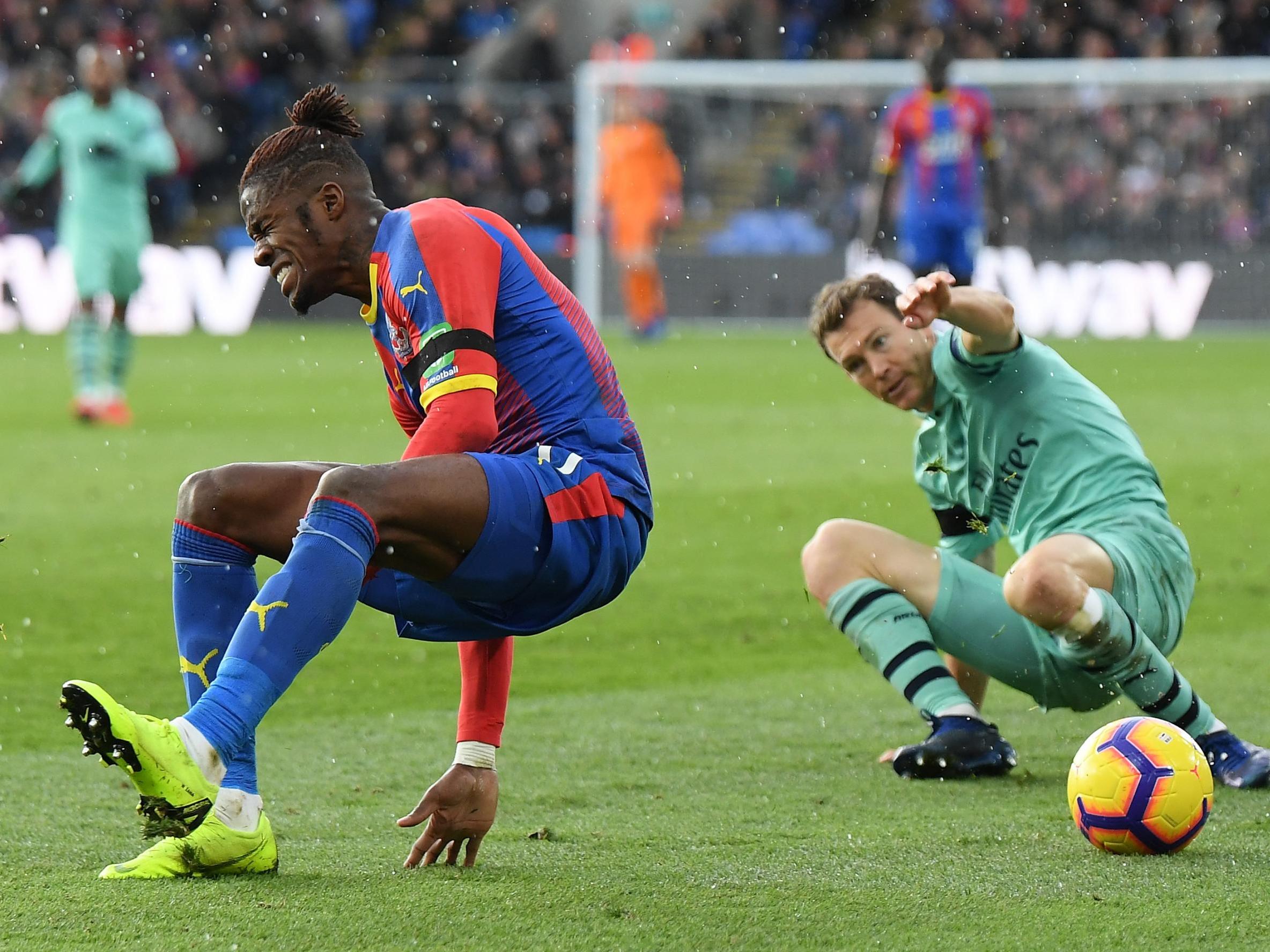 Wilfried Zaha was accused of diving against Arsenal