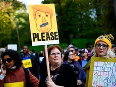 Trump kept away from thousands of protesters on Pittsburgh visit