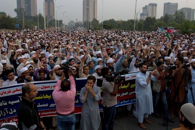 Pakistan protesters and religious students listen to their leaders during a rally to condemn a Supreme Court decision that ordered the release of Asia Bibi