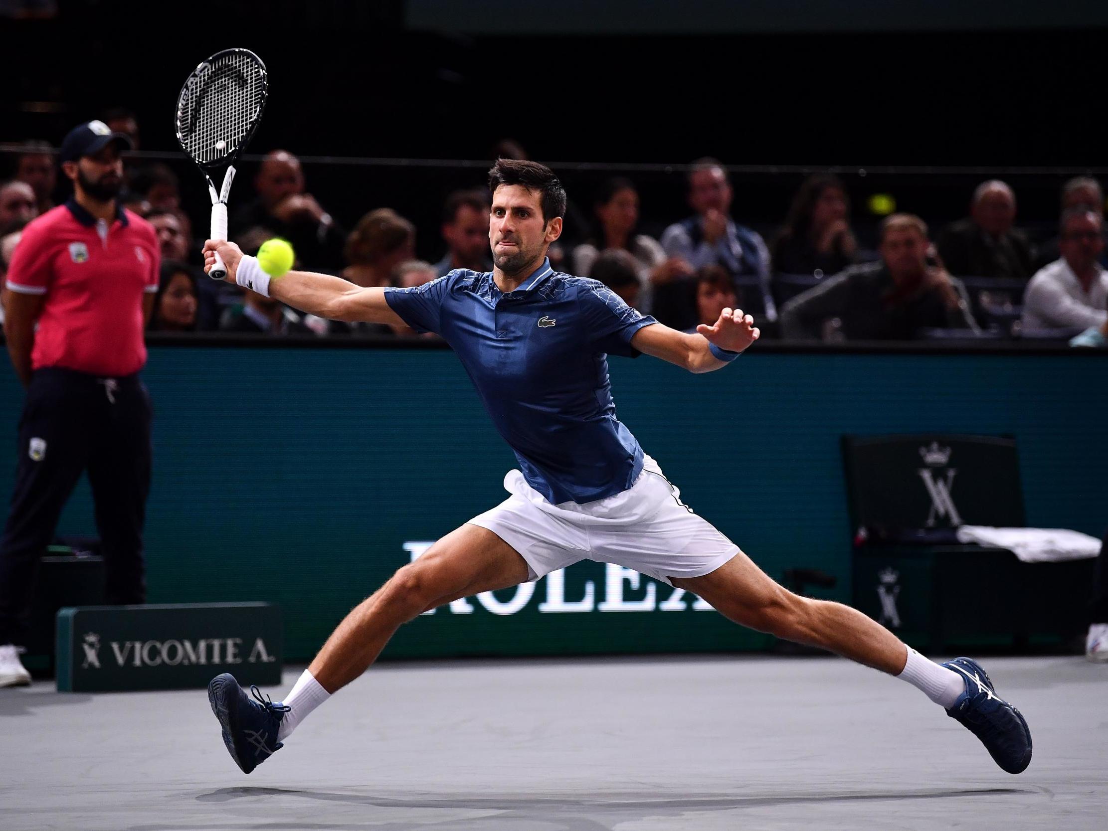 Novak Djokovic in action against Joao Sousa at the Paris Masters