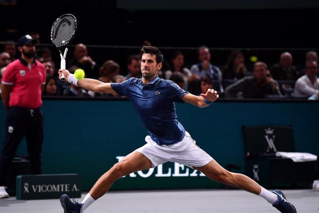Novak Djokovic in action against Joao Sousa at the Paris Masters