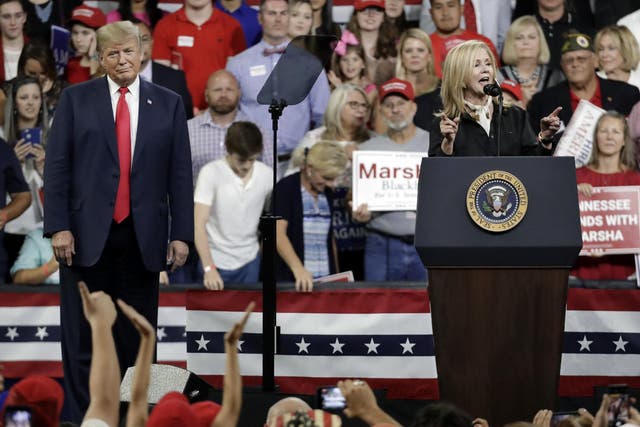 Republican Marsha Blackburn speaks as President Donald Trump listens at a rally in Johnson City, Tennessee