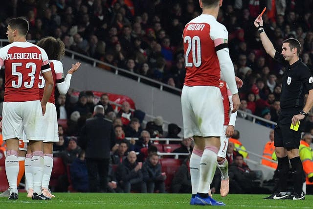 Matteo Guendouzi is shown red for two yellow cards