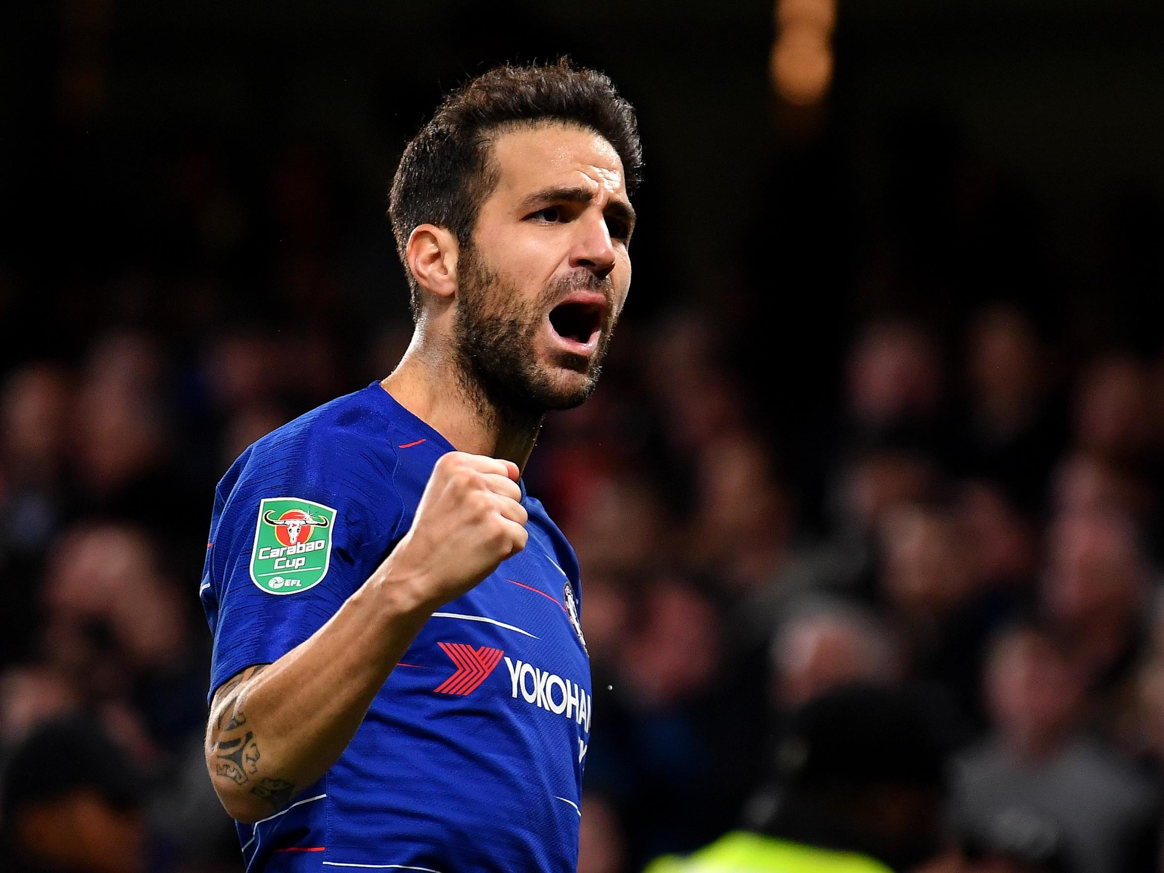 Cesc Fabregas celebrates his goal against Derby