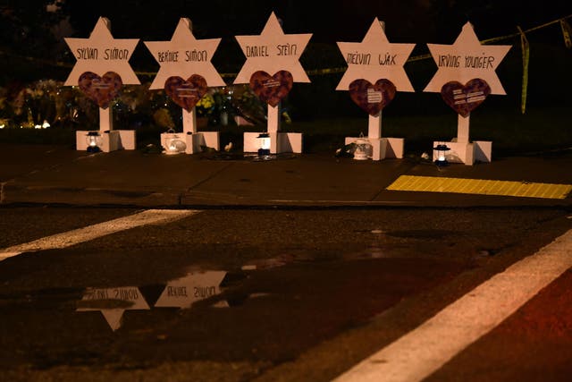 The names of the victims are displayed at a memorial on 28 October 2018 outside the Tree of Life synagogue after a shooting there left 11 people dead in the Squirrel Hill neighbourhood of Pittsburgh, Pennsylvania