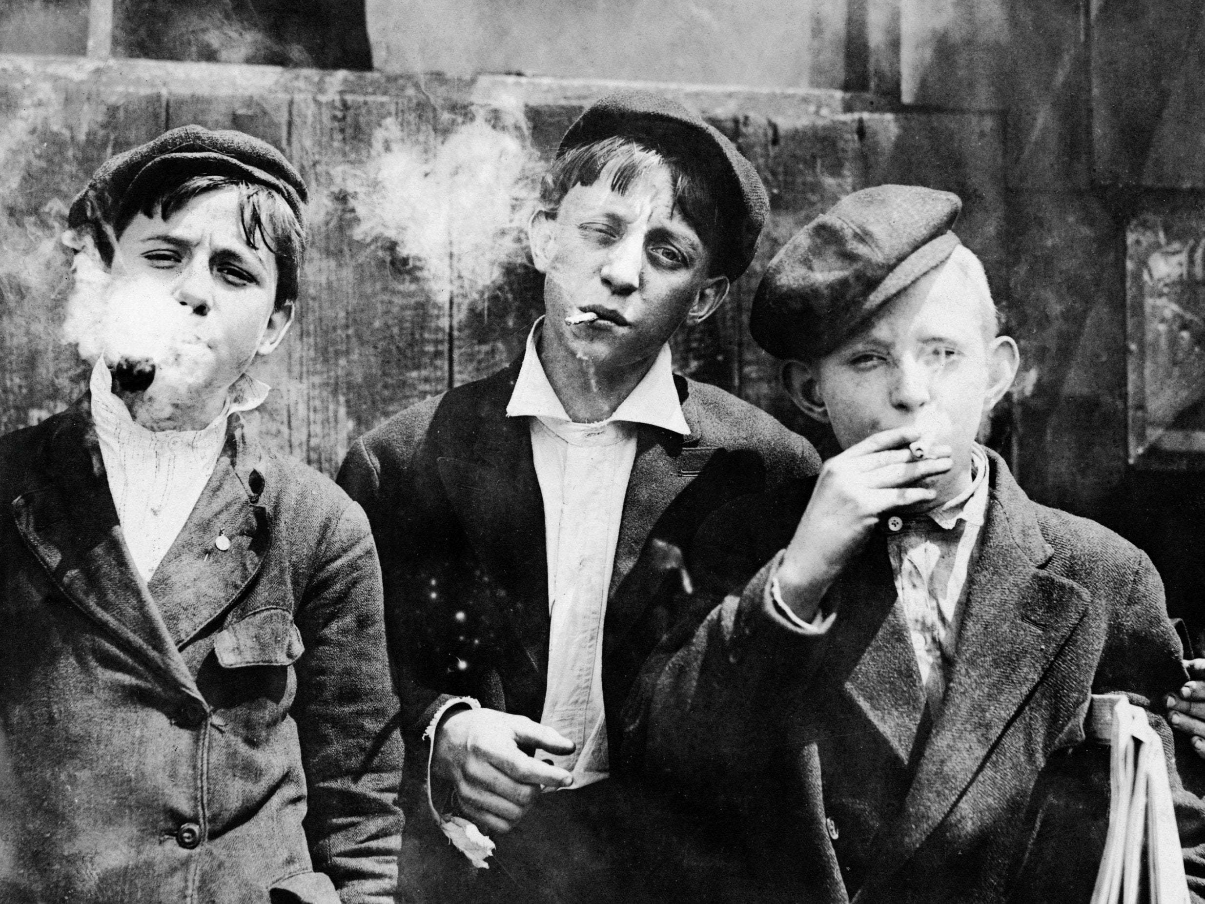 Newspaper boys smoking at Skeeter’s Branch near Franklin in St Louis, Missouri, 1910