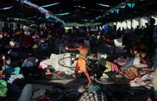 Hondurans in migrant caravan sue Trump administration