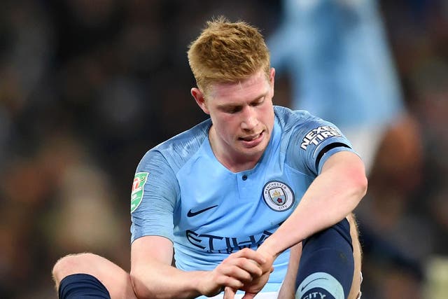 Kevin De Bruyne left the pitch clutching at his left knee