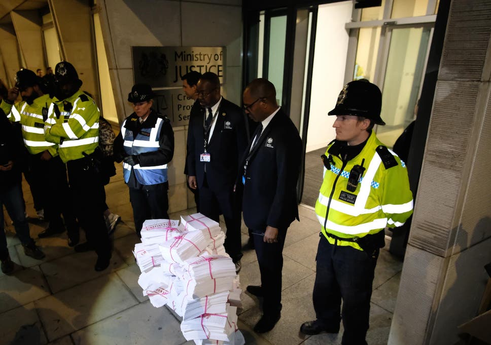 Protesters dumped documents representing rape victims’ phone data outside the CPS’s offices in November