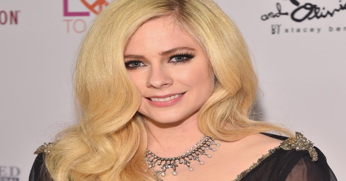 Avril Lavigne responds to rumours she died and was replaced by body double  named Melissa, The Independent