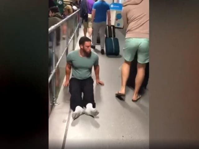 Justin Levene as he dragged himself through the airport