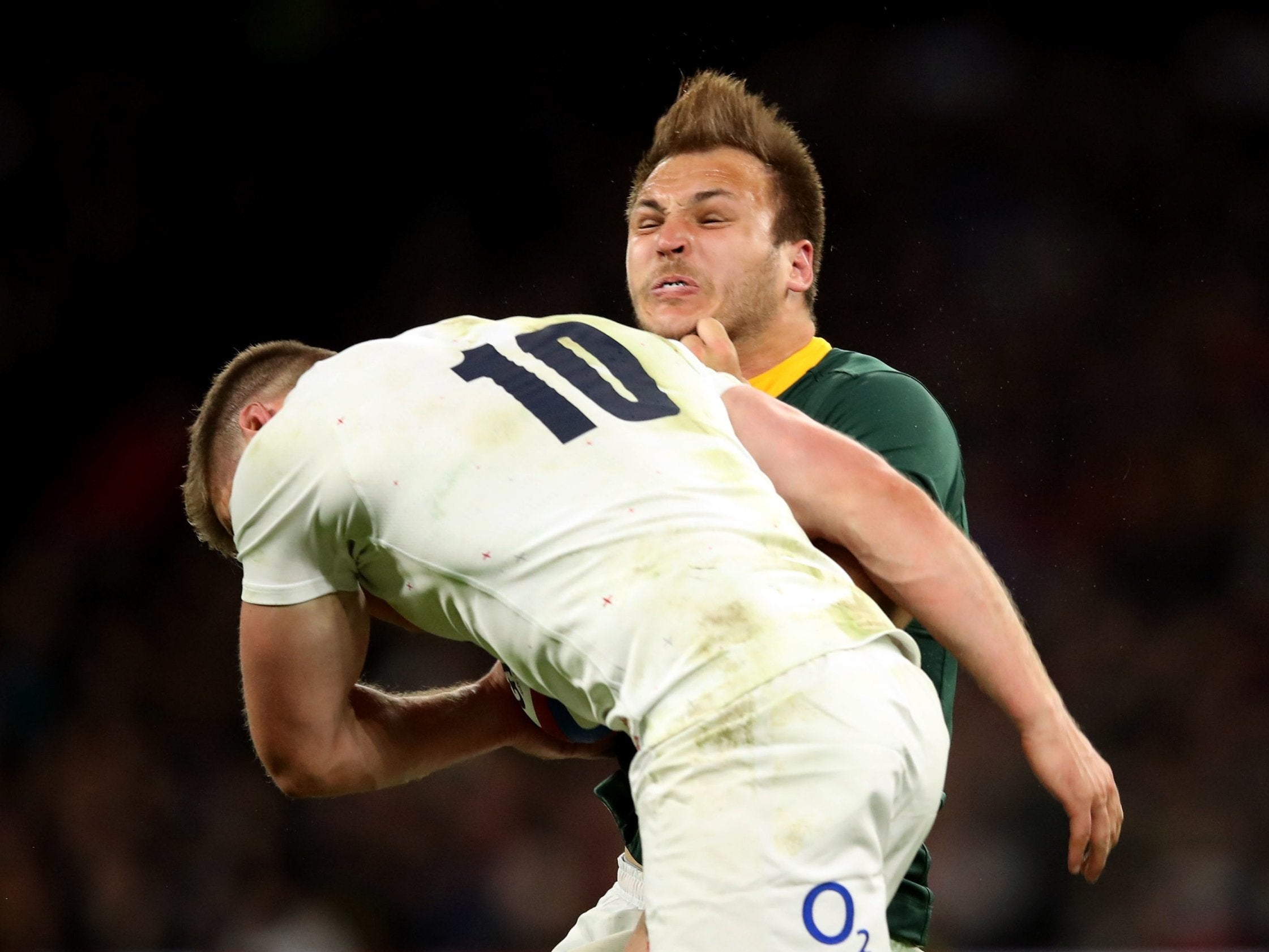 Owen Farrell tackles Andre Esterhuizen with the final play of England's win over South Africa