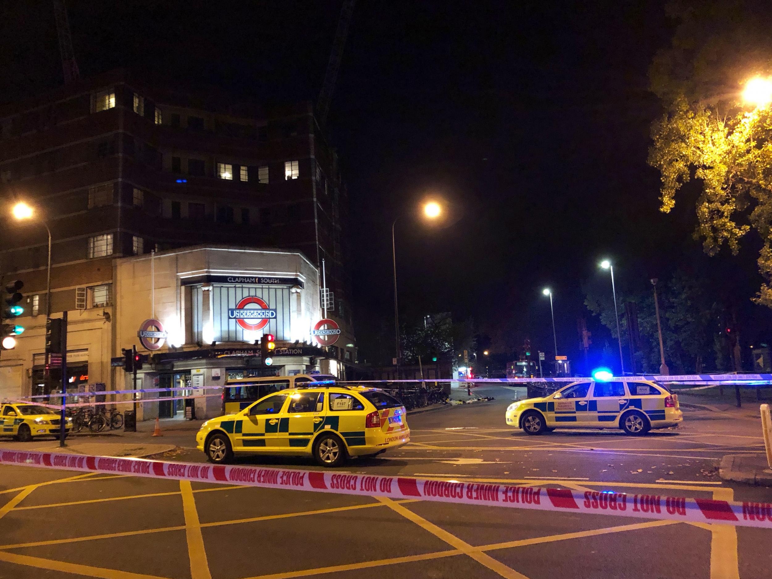 Police activity outside Clapham South tube station after Malcolm Mide-Madariola was fatally stabbed on Friday 2 November