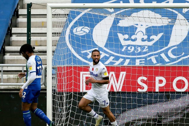 Kemar Roofe celebrates scoring Leeds' second goal against Wigan