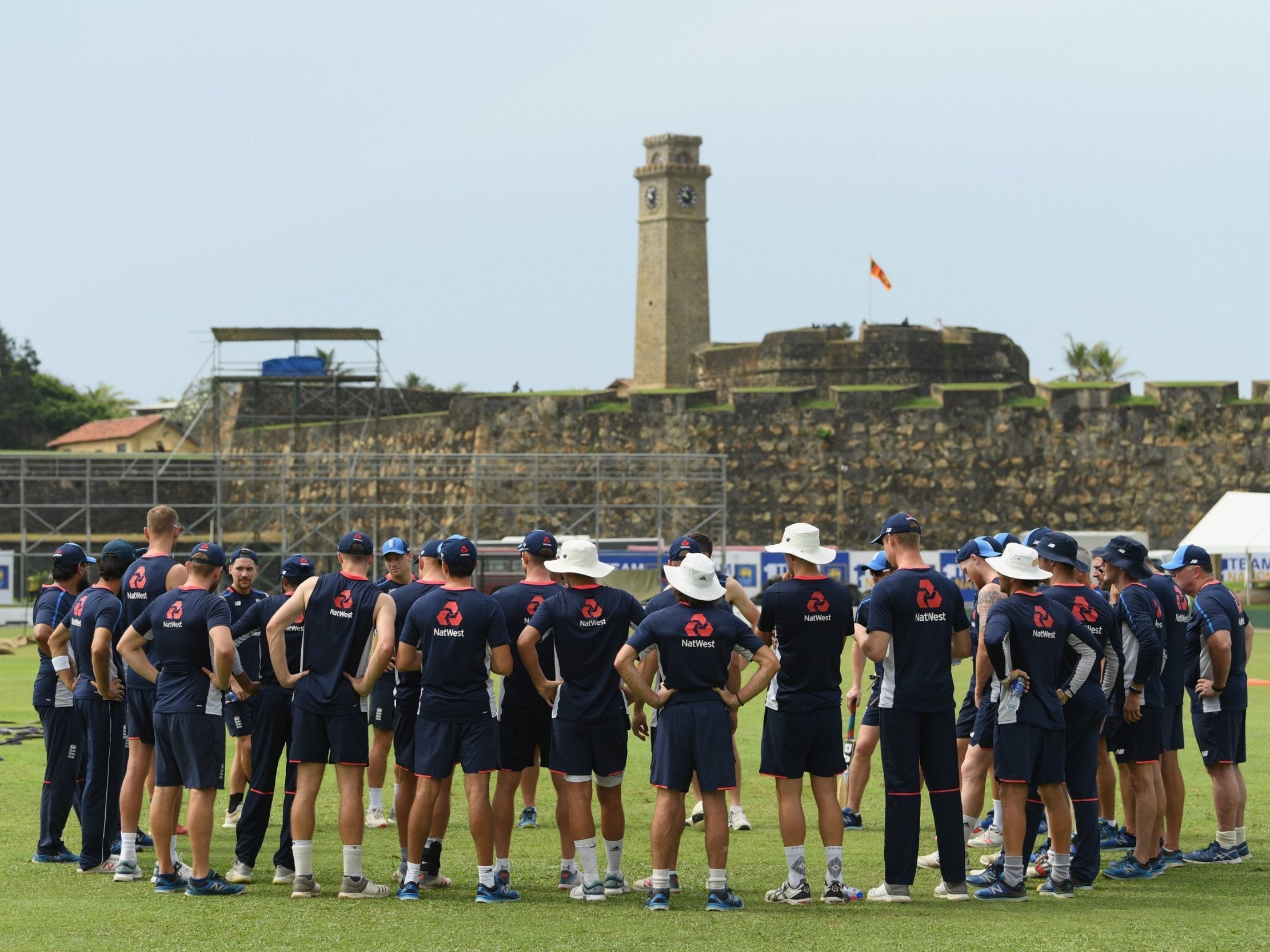 Galle's fort looks over rising stands and England's team meeting