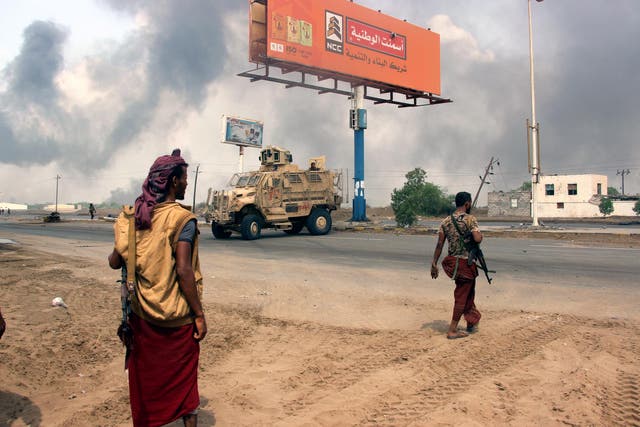 Yemeni government forces patrol near the port city of Hodeidah, Yemen, ahead of an offensive