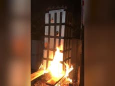 Laughing party-goers burn Grenfell Tower model in 'callous' scenes 