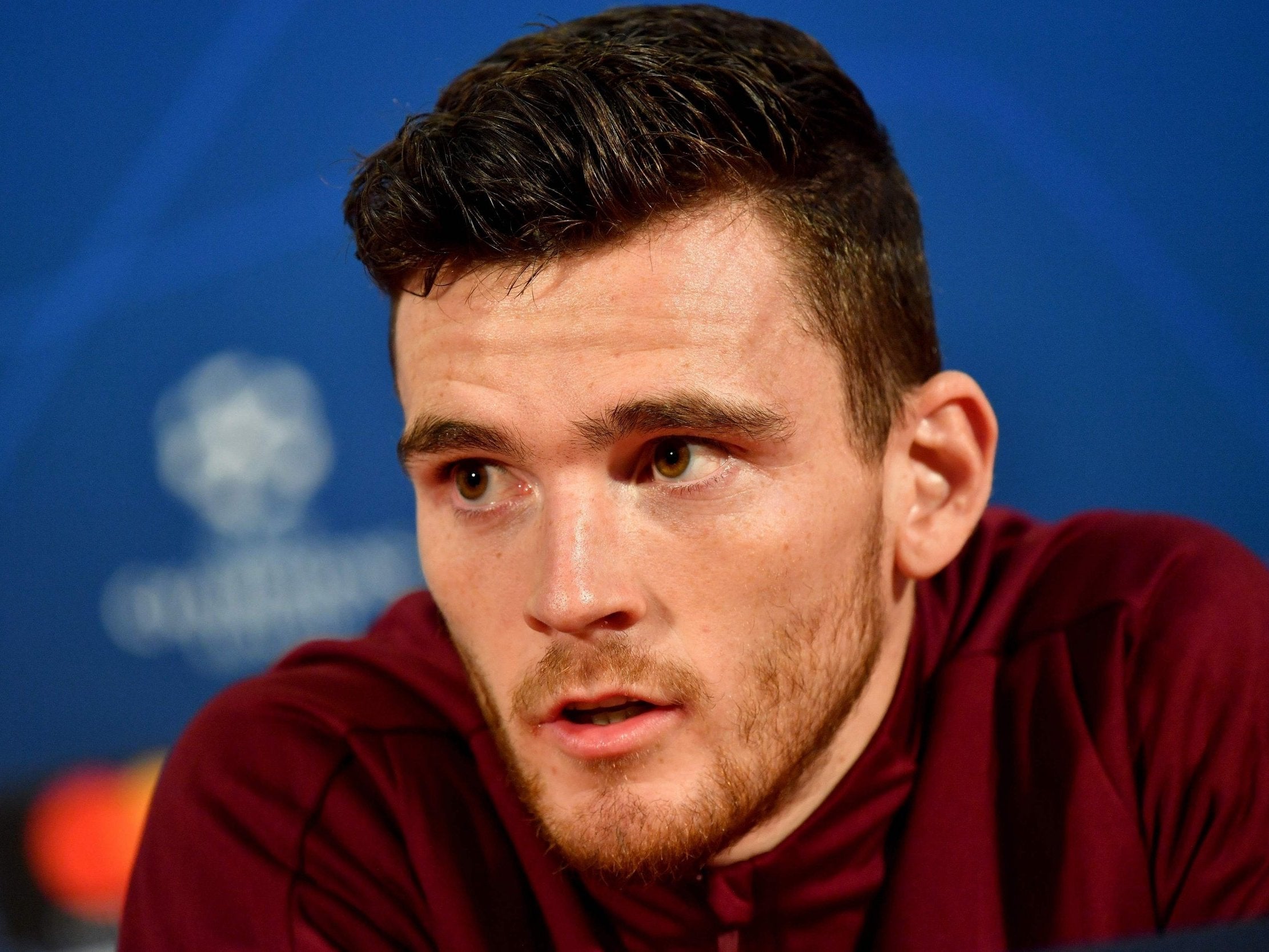 Liverpool's Andrew Robertson looks on