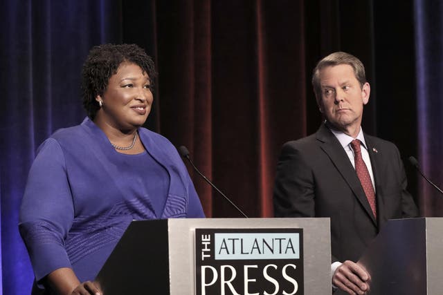 <p>Brian Kemp y Stacey Abrams</p>