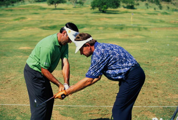 Seve Ballesteros and Nick Price on the range in Sun City in 1997
