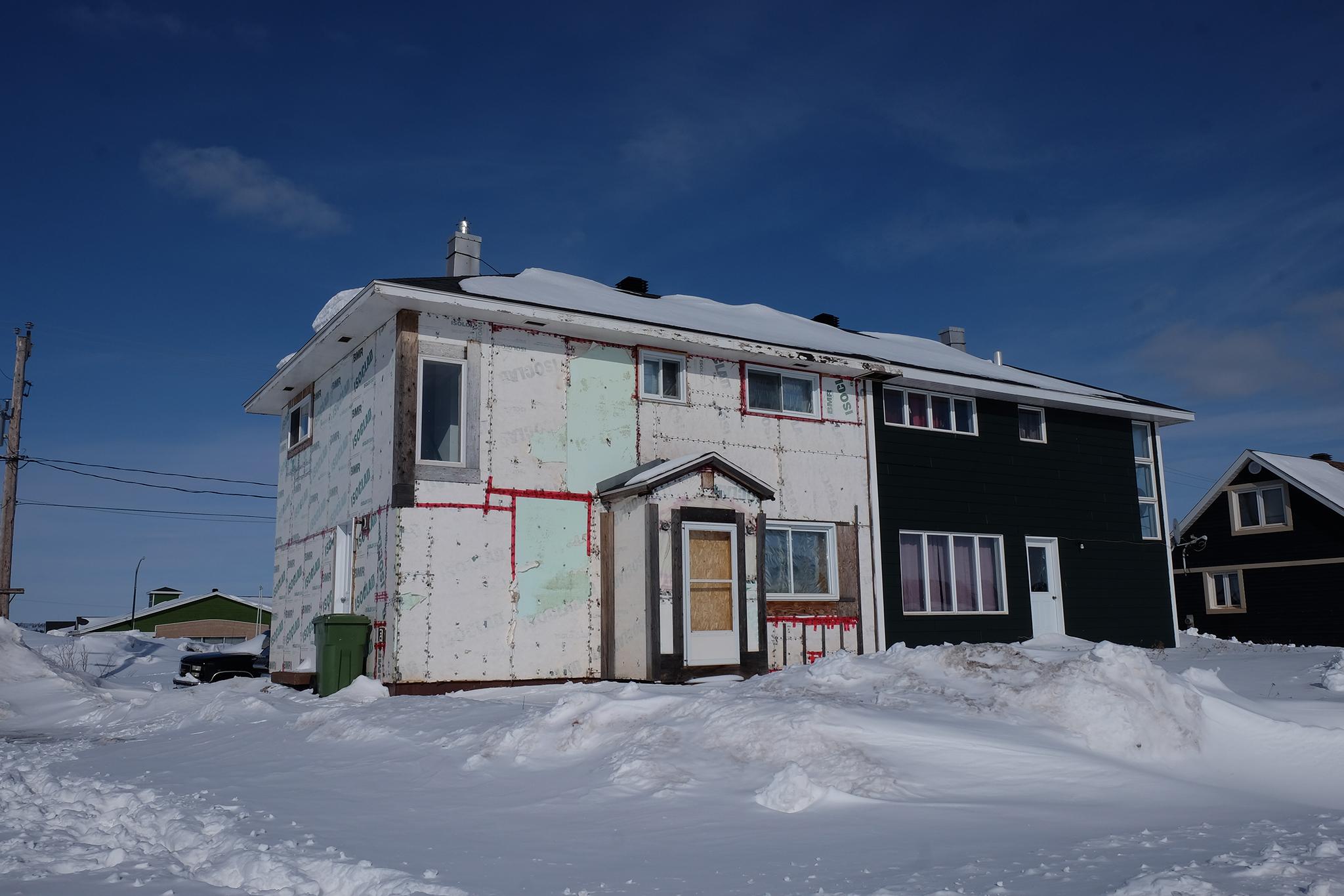 Most of the compact, two-storey houses are clad in smartly painted wood, while others are unfinished, the insulation exposed