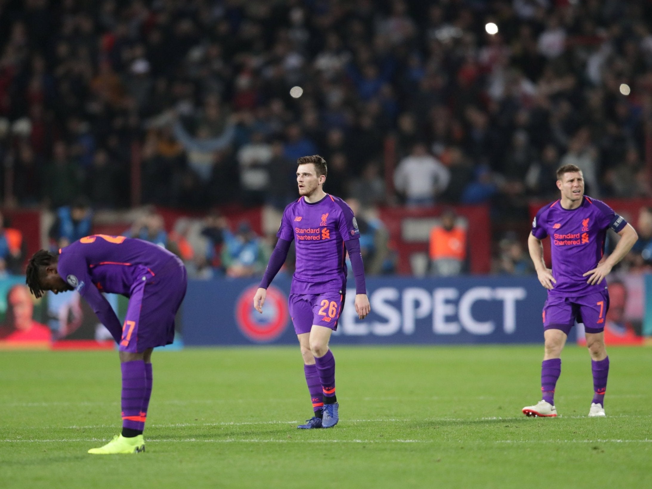 Liverpool's Andrew Robertson and James Milner look dejected after the match