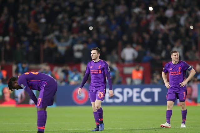 Liverpool's Andrew Robertson and James Milner look dejected after the match