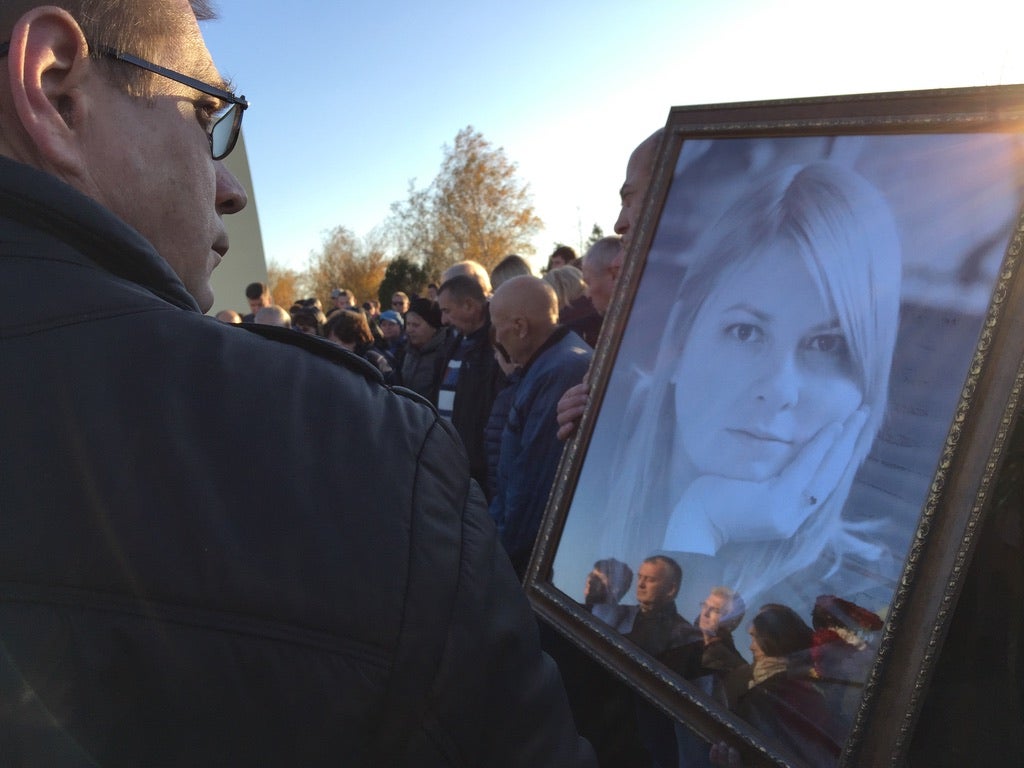 A portrait of the activist at her funeral on Wednesday