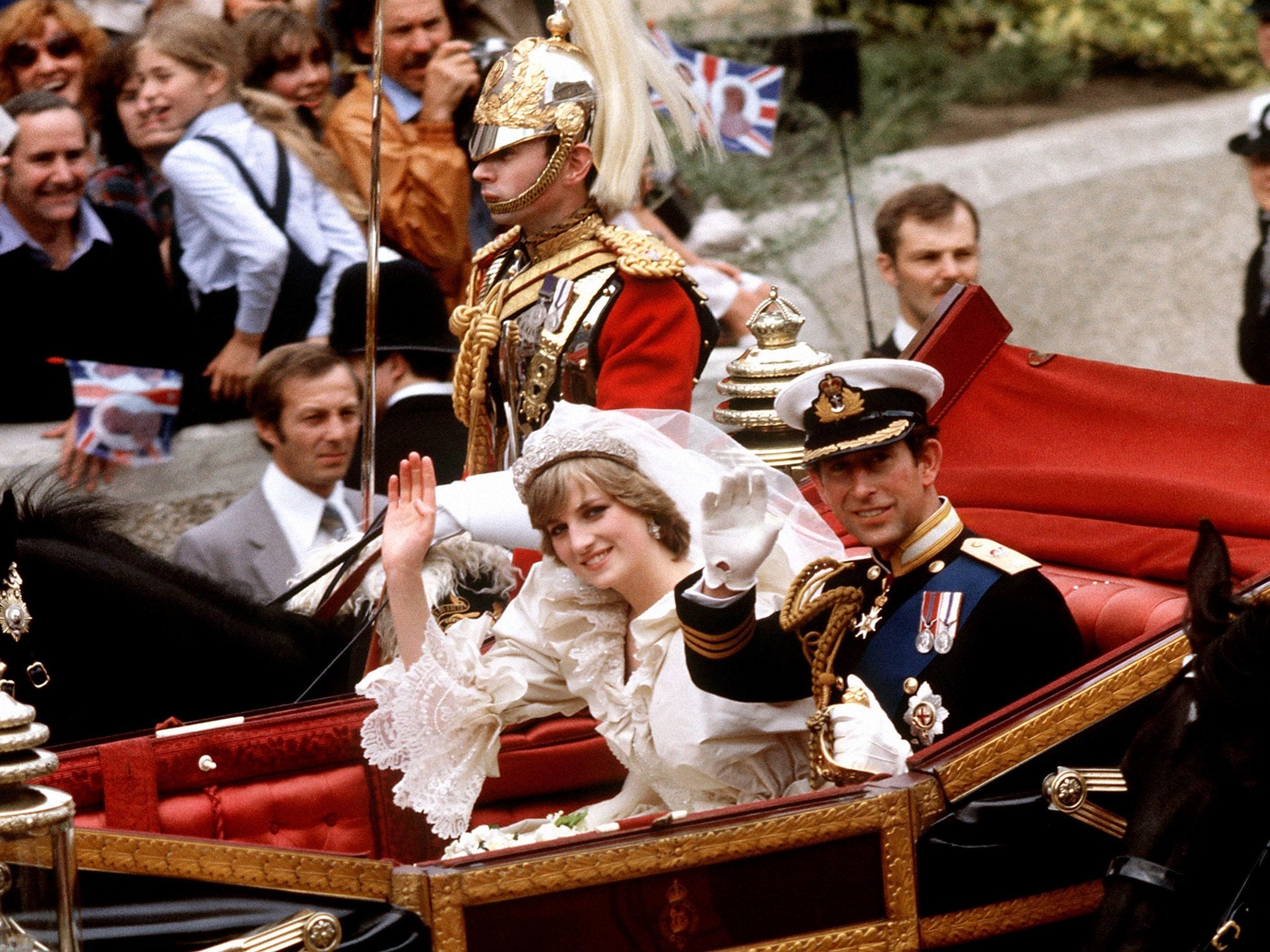 Charles and Diana making their way to Buckingham Palace after the wedding ceremony at St Paul's (PA)