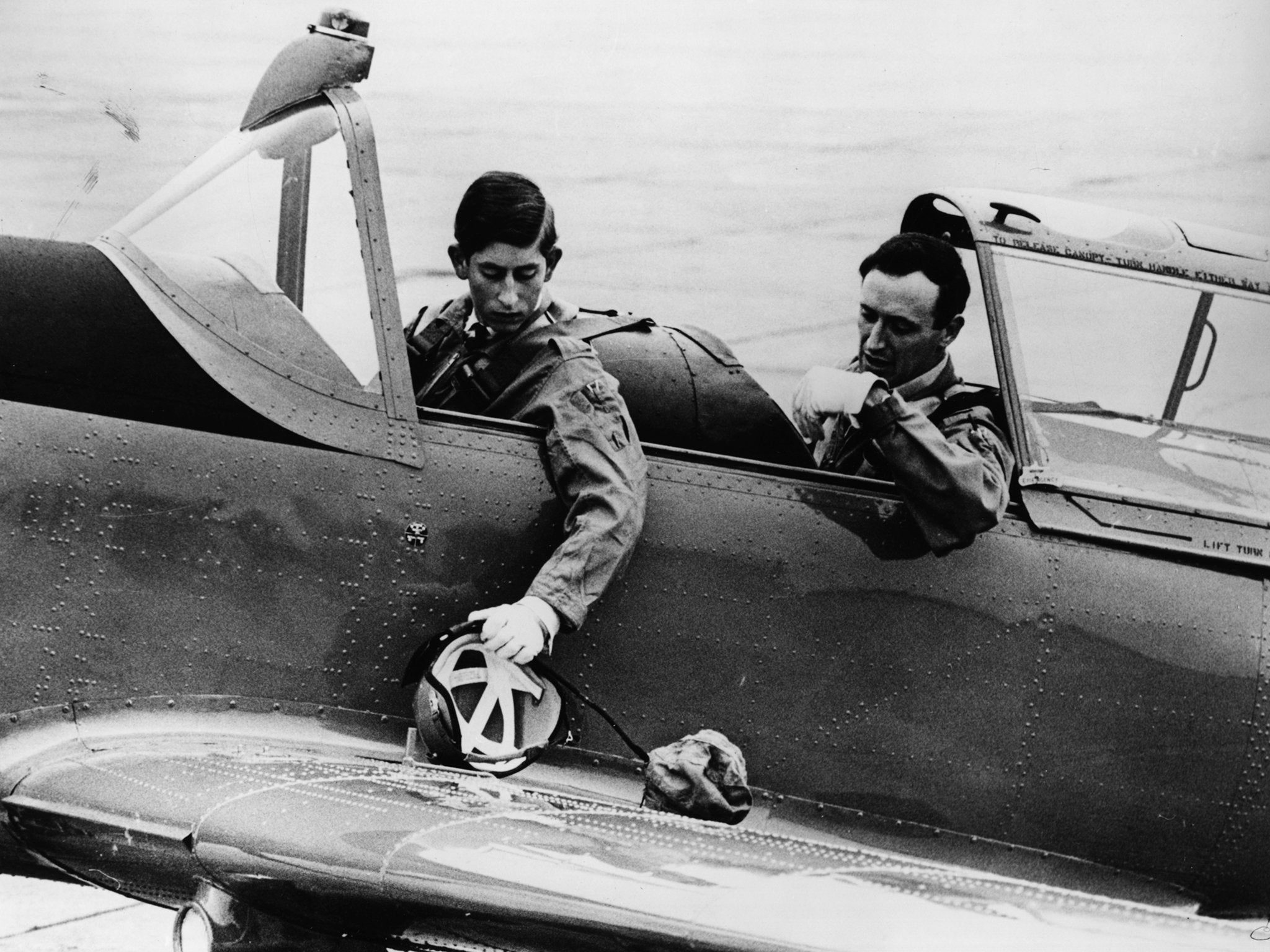 Charles in a Chipmunk training aircraft with squadron leader Philip Pinney during a flying lesson at RAF Tangmere, near Chichester, England, 1968 (Getty)