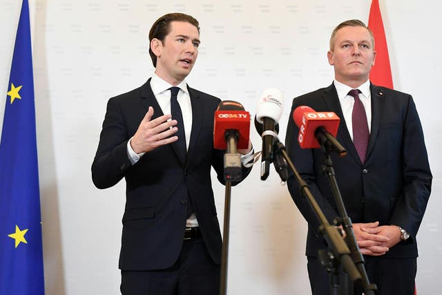 Austrian chancellor Sebastian Kurz (left) and defence minister Mario Kunasek (right) give a press conference in Vienna,