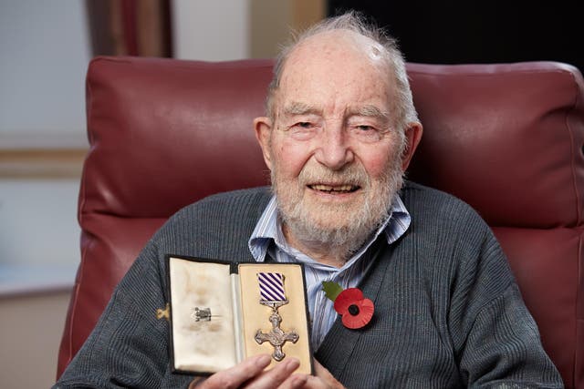 John Geddes with his British Empire Medal and Distinguished Flying Cross