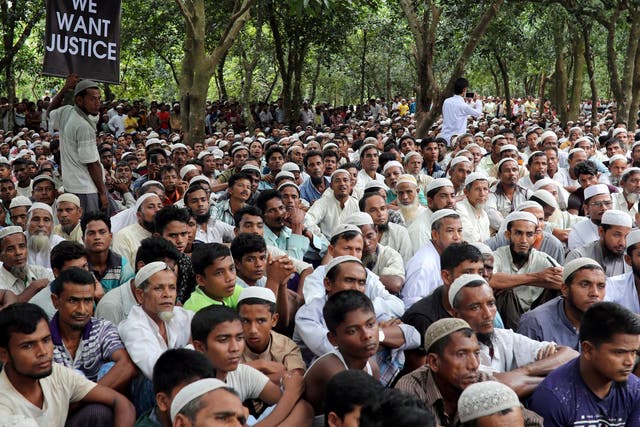 Rohingya refugees take part in a protest marking the one year anniversary of their exodus from Myanmar in Cox's Bazar, Bangladesh