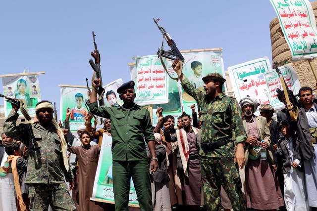 Houthi followers demonstrate to show rejection of an offer by the Saudi-led coalition to pay compensation for victims of an air strike in Saada, Yemen