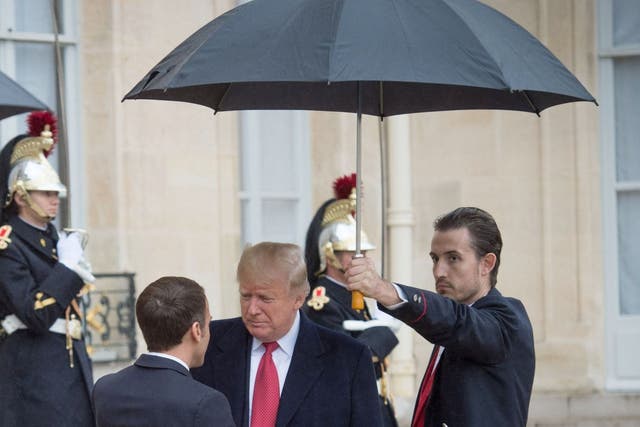 Donald Trump meets French president Emmanuel Macron in Paris.