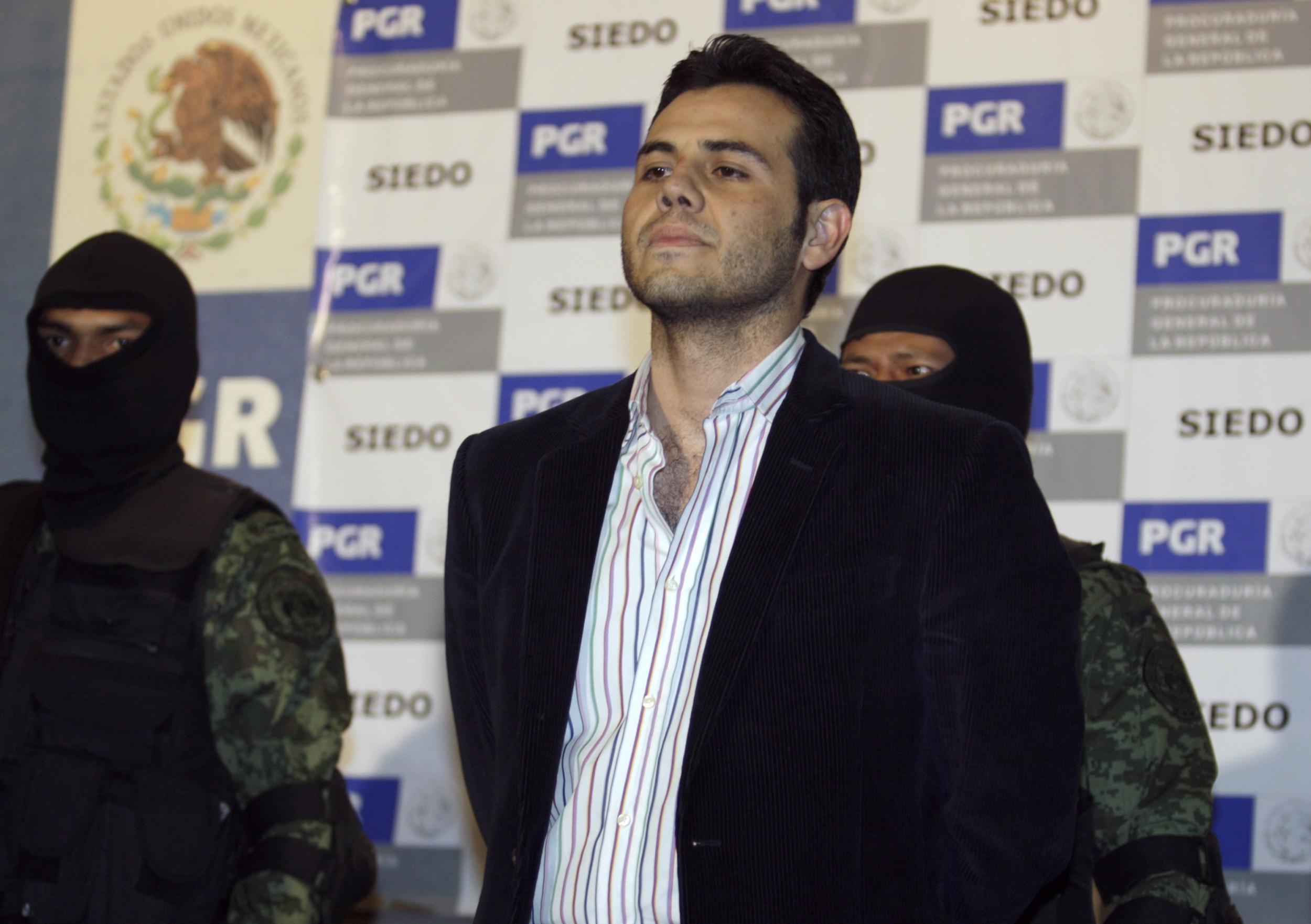 Mexican drug trafficker Vicente Zambada Niebla is presented to the media in Mexico City March 19, 2009.