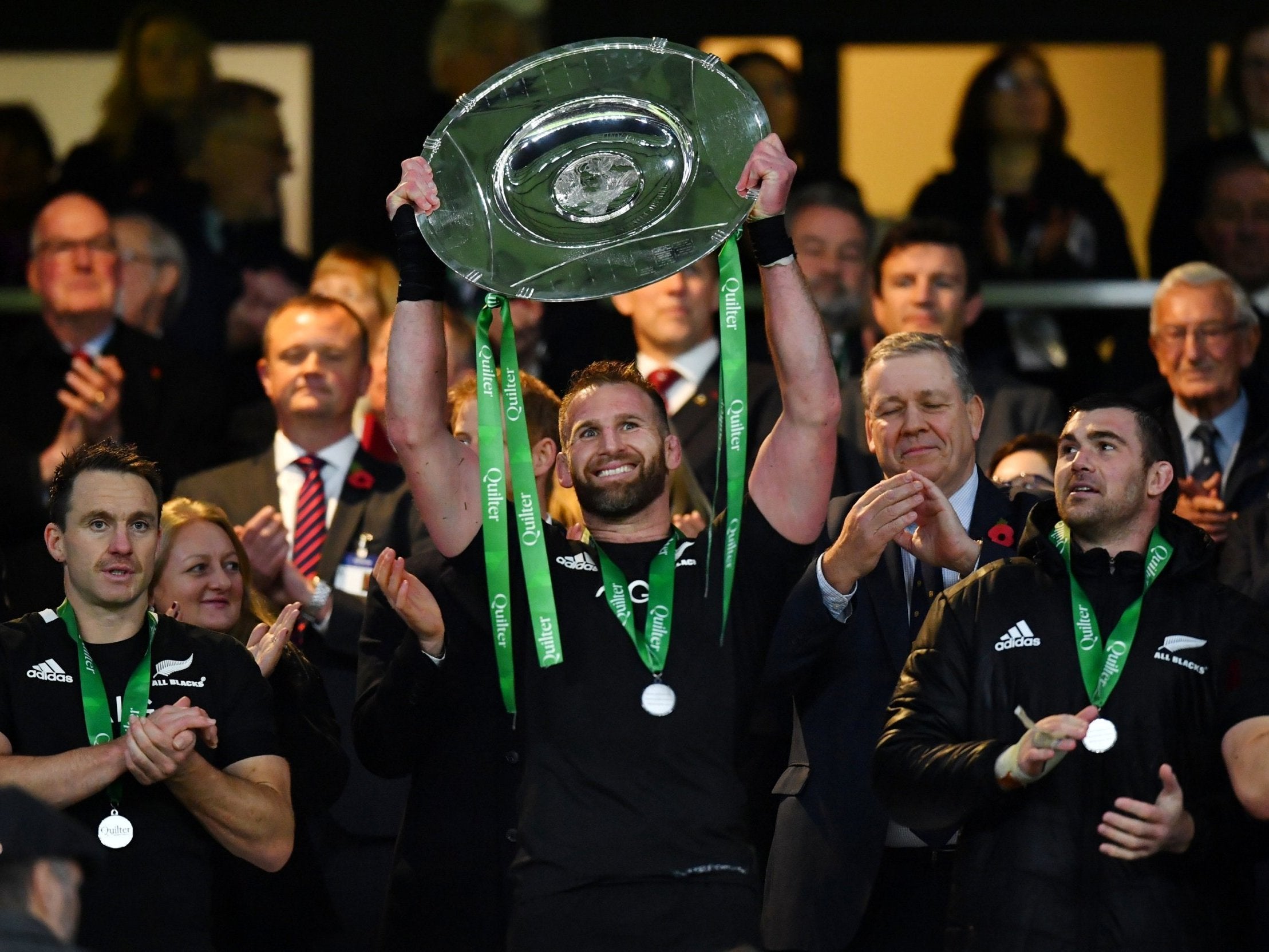 New Zealand's Kieran Read lifts the trophy after the match