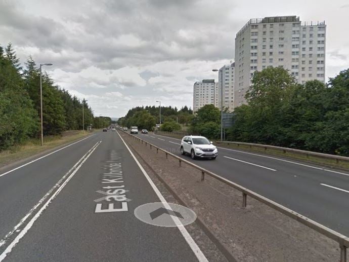 The crash, at East Kilbride near Glasgow, left a motorcyclist dead and a car driver needing hospital treatment