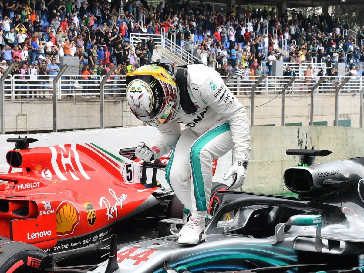 Brazil Grand Prix: Lewis Hamilton takes pole with Interlagos track record