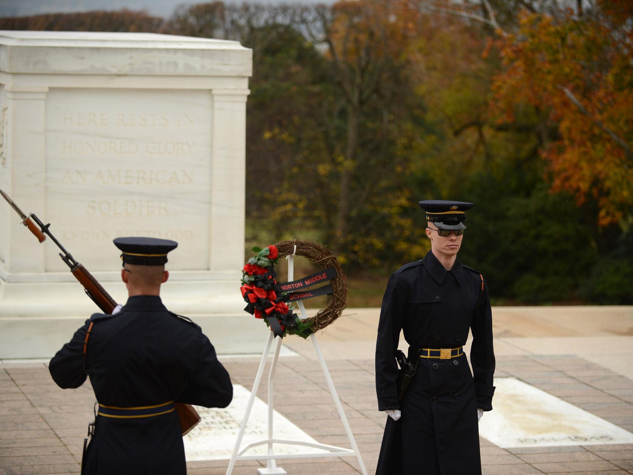 Honour guards patrol the Tomb of the Unknown Soldier at Arlington National Cemetery in Arlington, Virginia, on Friday. (Astrid Riecken /