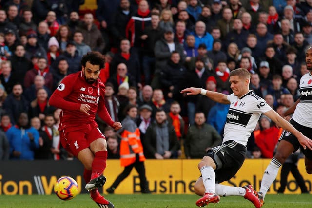 Mohamed Salah scores to put Liverpool ahead on controversial circumstances