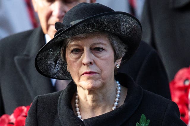 British Prime Minister Theresa May attends the annual Remembrance Sunday memorial at the Cenotaph on Whitehall on November 11, 2018 in London, England. The armistice ending the First World War between the Allies and Germany was signed at Compiègne, France on eleventh hour of the eleventh day of the eleventh month - 11am on the 11th November 1918. This day is commemorated as Remembrance Day with special attention being paid for this year’s centenary.