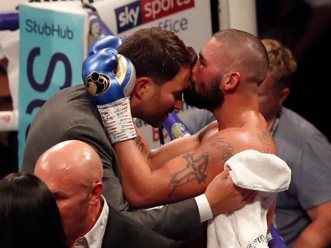 Bellew embraces Hearn after announcing his retirement from boxing