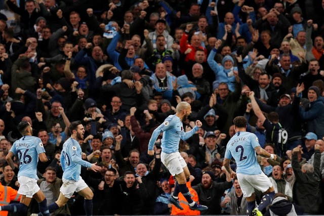 David Silva jumps for joy after scoring Manchester City's opening goal against Manchester United