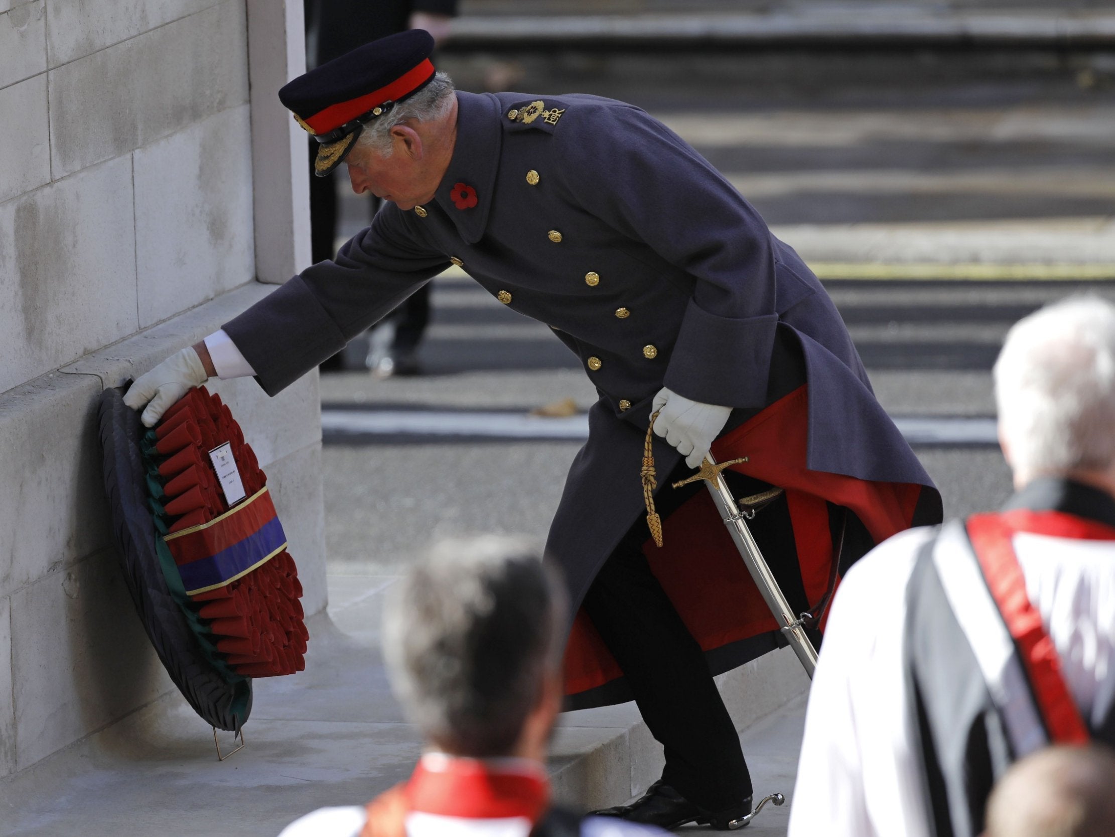 Prince Charles lays wreath at the Cenotaph in place of the Queen