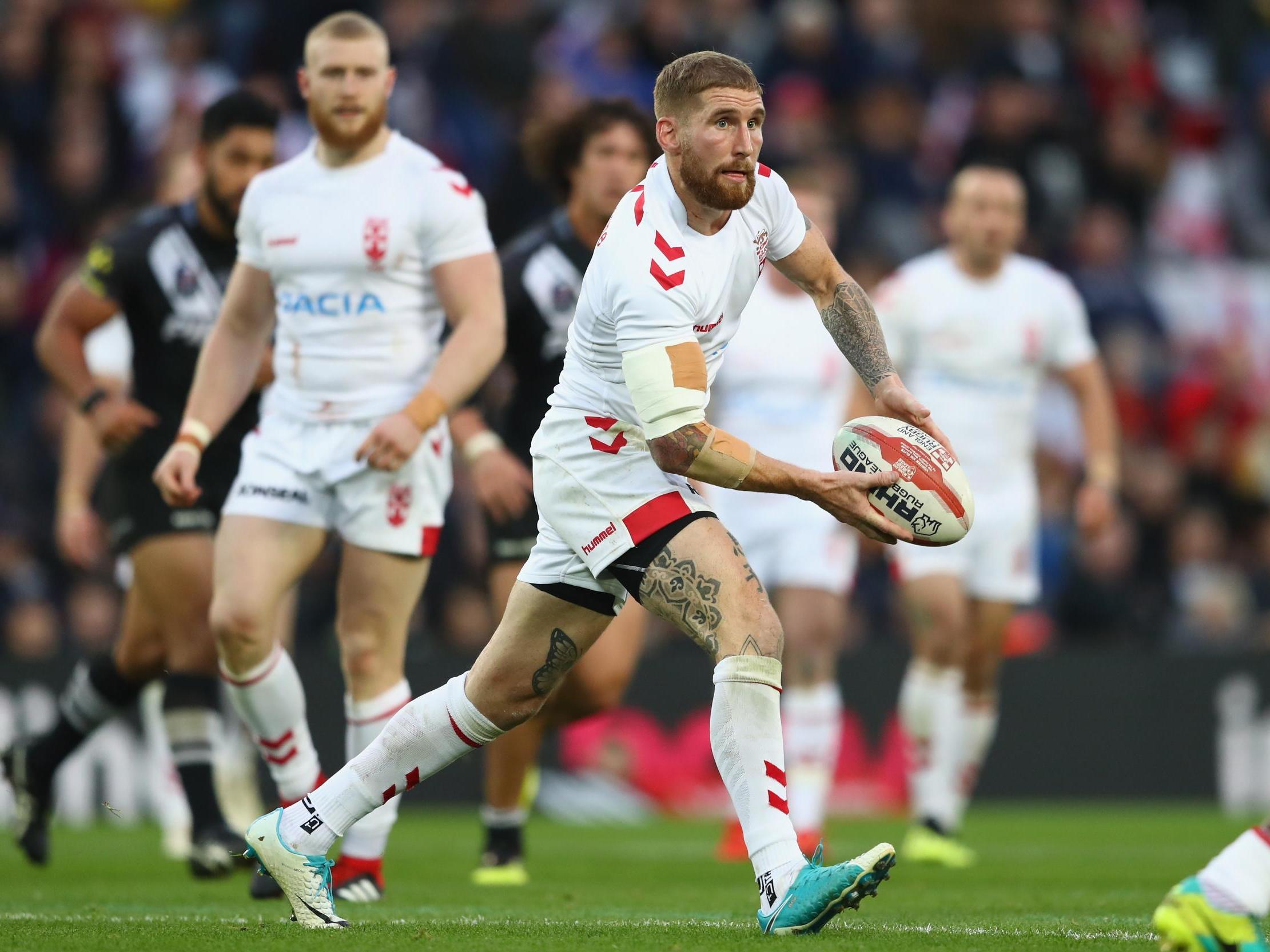 Sam Tomkins in action for England